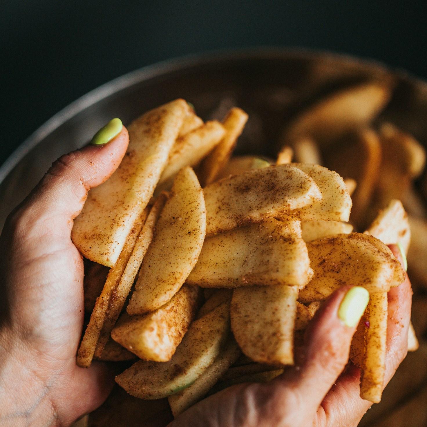 Community members collaborating in a modern kitchen space, sharing recipes and cooking techniques